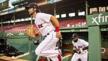 BOSTON, MA - AUGUST 11: Andrew Benintendi #16 of the Boston Red Sox runs onto the field before a game against the Tampa Bay Rays on August 11, 2020 at Fenway Park in Boston, Massachusetts. (Photo by Billie Weiss/Boston Red Sox/Getty Images)