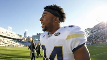 Nov 19, 2016; Atlanta, GA, USA; Georgia Tech Yellow Jackets running back Marcus Marshall (34) celebrates a victory against the Virginia Cavaliers at Bobby Dodd Stadium. Georgia Tech defeated Virginia 31-17. Mandatory Credit: Brett Davis-USA TODAY Sports