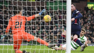GLASGOW, SCOTLAND - JANUARY 25: James Forrest of Celtic has a shot saved by Nathan Baxter of Ross County during the Ladbrokes Premiership match between Celtic and Ross County at Celtic Park on January 25, 2020 in Glasgow, Scotland. (Photo by George Wood/Getty Images)