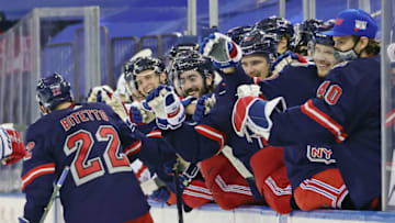 Feb 4, 2021; New York, NY, USA; The New York Rangers celebrate after a second period goal by defenseman Anthony Bitetto (22) against the Washington Capitals at Madison Square Garden. Mandatory Credit: Bruce Bennett/Pool Photo-USA TODAY Sports