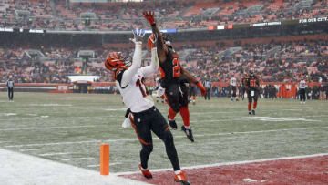 CLEVELAND, OH - DECEMBER 11: Alex Erickson #12 of the Cincinnati Bengals can't make the catch against Briean Boddy-Calhoun #20 of the Cleveland Browns at Cleveland Browns Stadium on December 11, 2016 in Cleveland, Ohio. (Photo by Justin K. Aller/Getty Images)