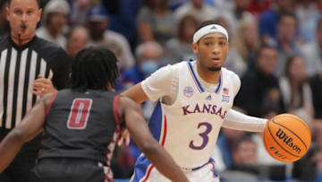 Kansas redshirt senior guard Dajuan Harris Jr. (3) looks for an open pass during the first half of Monday's game against North Carolina Centeral inside Allen Fieldhouse.