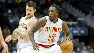 Dec 2, 2016; Atlanta, GA, USA; Atlanta Hawks forward Taurean Prince (12) dribbles against the Detroit Pistons in the fourth quarter at Philips Arena. The Pistons defeated the Hawks 121-85. Mandatory Credit: Brett Davis-USA TODAY Sports