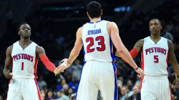 Dec 9, 2015; Auburn Hills, MI, USA; Detroit Pistons guard Reggie Jackson (1) and guard Kentavious Caldwell-Pope (5) high five forward Ersan Ilyasova (23) during the fourth quarter against the Memphis Grizzlies at The Palace of Auburn Hills. against the Memphis won 93-92. Mandatory Credit: Tim Fuller-USA TODAY Sports