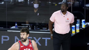 LAKE BUENA VISTA, FLORIDA - AUGUST 12: Assistant coach Adrian Griffin of the Toronto Raptors looks on during first-half action against the Philadelphia 76ers after head coach Nick Nurse stepped down for the night to let Griffin coach at The Field House at ESPN Wide World Of Sports Complex on August 12, 2020 in Lake Buena Vista, Florida. NOTE TO USER: User expressly acknowledges and agrees that, by downloading and or using this photograph, User is consenting to the terms and conditions of the Getty Images License Agreement. (Photo by Ashley Landis-Pool/Getty Images)
