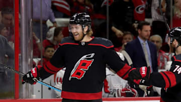 RALEIGH, NC - APRIL 15: Dougie Hamilton #19 of the Carolina Hurricanes scores a goal and celebrates in Game Three of the Eastern Conference First Round against the Washington Capitals during the 2019 NHL Stanley Cup Playoffs on April 15, 2019 at PNC Arena in Raleigh, North Carolina. (Photo by Gregg Forwerck/NHLI via Getty Images)