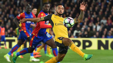 Arsenal's English midfielder Theo Walcott controls the ball during the English Premier League football match between Crystal Palace and Arsenal at Selhurst Park in south London on April 10, 2017. / AFP PHOTO / Glyn KIRK / RESTRICTED TO EDITORIAL USE. No use with unauthorized audio, video, data, fixture lists, club/league logos or 'live' services. Online in-match use limited to 75 images, no video emulation. No use in betting, games or single club/league/player publications. / (Photo credit should read GLYN KIRK/AFP/Getty Images)