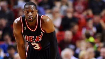 Jan 26, 2014; Miami, FL, USA; Miami Heat shooting guard Dwyane Wade (3) takes a breather during the first half against the San Antonio Spurs at American Airlines Arena. Mandatory Credit: Steve Mitchell-USA TODAY Sports