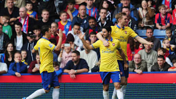 LONDON, ENGLAND - OCTOBER 26: Mikel Arteta (2ndR) of Arsenal celebrates scoring his penalty with Mesut Oezil (L) and Per Mertesacker (R) during the Barclays Premier League match between Crystal Palace and Arsenal at Selhurst Park on October 26, 2013 in London, England. (Photo by Shaun Botterill/Getty Images)