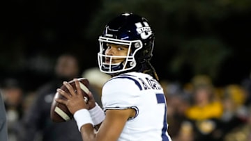Auburn footballOct 22, 2022; Laramie, Wyoming, USA; Utah State Aggies quarterback Bishop Davenport (7) warms up before a game against the Wyoming Cowboys at Jonah Field at War Memorial Stadium. Mandatory Credit: Troy Babbitt-USA TODAY Sports