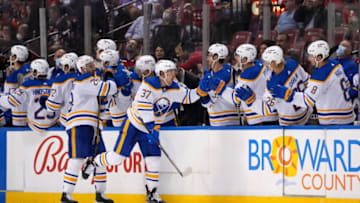 Dec 2, 2021; Sunrise, Florida, USA; Buffalo Sabres center Casey Mittelstadt (37) celebrates his goal against the Florida Panthers with teammates on the bench during the second period at FLA Live Arena. Mandatory Credit: Jasen Vinlove-USA TODAY Sports