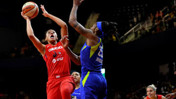 WASHINGTON, DC - JUNE 9:Washington Mystics forward Aerial Powers (23) shoots over Dallas Wings forward Glory Johnson (25) in the second half at Washington Entertainment and Sports Arena June 09, 2019 in Washington, DC. The Washington Mystics beat the Dallas Wings 86-62.(Photo by Katherine Frey/The Washington Post via Getty Images)
