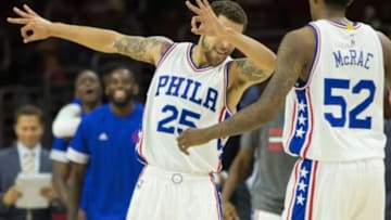 Oct 8, 2015; Philadelphia, PA, USA; Philadelphia 76ers guard Scottie Wilbekin (25) reacts with guard Jordan McRae (52) after hitting a three pointer against the Cleveland Cavaliers to take the lead with one second to go in the second half at Wells Fargo Center. The 76ers won 115-114. Mandatory Credit: Bill Streicher-USA TODAY Sports