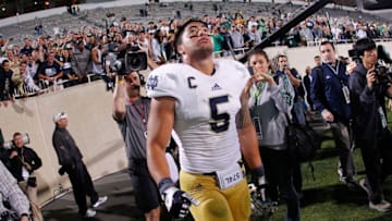EAST LANSING, MI - SEPTEMBER 15: Manti Te'o #5 of the Notre Dame Fighting Irish reacts after beating the Notre Dame Fighting Irish 20-3 at Spartan Stadium Stadium on September 15, 2012 in East Lansing, Michigan. (Photo by Gregory Shamus/Getty Images)