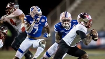 Dec 26, 2020; Mobile, AL, USA; Georgia State Panthers linebacker Jordan Strachan (7) and Georgia State Panthers linebacker Jontrey Hunter (1) pursue Western Kentucky Hilltoppers quarterback Tyrrell Pigrome (1) during the second half at Ladd-Peebles Stadium. Mandatory Credit: Vasha Hunt-USA TODAY Sports