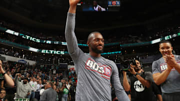 CHARLOTTE, NC - NOVEMBER 7: Kemba Walker #8 of the Boston Celtics watches his tribute video and thanks the crowd prior to a game against the Charlotte Hornets on November 7, 2019 at Spectrum Center in Charlotte, North Carolina. NOTE TO USER: User expressly acknowledges and agrees that, by downloading and or using this photograph, User is consenting to the terms and conditions of the Getty Images License Agreement. Mandatory Copyright Notice: Copyright 2019 NBAE (Photo by Kent Smith/NBAE via Getty Images)