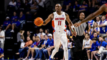 Nov 7, 2022; Gainesville, Florida, USA; Florida Gators guard Kyle Lofton (11) dribbles the ball at Exactech Arena at the Stephen C. O'Connell Center. Mandatory Credit: Matt Pendleton-USA TODAY Sports