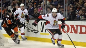 December 11, 2016; Anaheim, CA, USA; Ottawa Senators defenseman Chris Wideman (6) moves the puck against the defense of Anaheim Ducks right wing Ondrej Kase (86) during the second period at Honda Center. Mandatory Credit: Gary A. Vasquez-USA TODAY Sports
