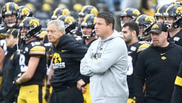 IOWA CITY, IOWA- OCTOBER 19: Head coach Kirk Ferentz and offensive coordinator Brian Ferentz of the Iowa Hawkeyes before the match-up against the Purdue Boilermakers on October 19, 2019 at Kinnick Stadium in Iowa City, Iowa. (Photo by Matthew Holst/Getty Images)
