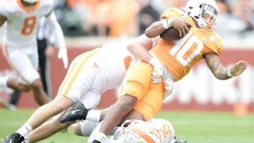 Tennessee running back Fred Orr (40) is tackled at the Orange & White spring game at Neyland Stadium in Knoxville, Tenn. on Saturday, April 24, 2021.Kns Vols Spring Game