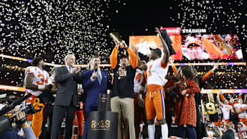 SANTA CLARA, CA - JANUARY 07: Head coach Dabo Swinney and Trayvon Mullen #1 of the Clemson Tigers celebrate their teams 44-16 win over the Alabama Crimson Tide with the trophy in the CFP National Championship presented by AT&T at Levi's Stadium on January 7, 2019 in Santa Clara, California. (Photo by Ezra Shaw/Getty Images)