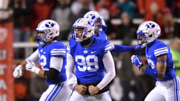 SALT LAKE CITY, UT - NOVEMBER 24: Mitch Harris #98 of the Brigham Young Cougars and teammates celebrate a fumble recovery against the Utah Utes in the first half of a game at Rice-Eccles Stadium on November 24, 2018 in Salt Lake City, Utah. (Photo by Gene Sweeney Jr/Getty Images)