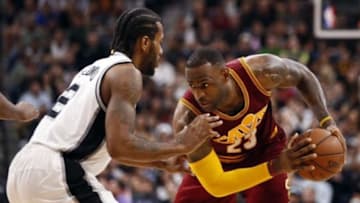 Jan 14, 2016; San Antonio, TX, USA; Cleveland Cavaliers small forward LeBron James (23) is defended by San Antonio Spurs small forward Kawhi Leonard (2) during the second half at AT&T Center. Mandatory Credit: Soobum Im-USA TODAY Sports