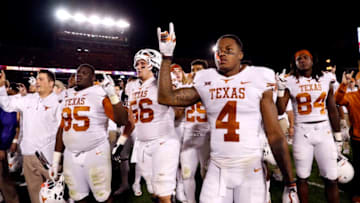 AMES, IA - SEPTEMBER 28: The Texas Longhorns celebrate their 17-7 win over the Iowa State Cyclones at Jack Trice Stadium on September 28, 2017 in Ames, Iowa. The Texas Longhorns won 17-7 over the Iowa State Cyclones. (Photo by David Purdy/Getty Images)