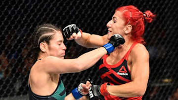MEXICO CITY, MEXICO - AUGUST 05: (L-R) Alexa Grasso of Mexico punches Randa Markos of Iraq in their women's strawweight bout during the UFC Fight Night event at Arena Ciudad de Mexico on August 5, 2017 in Mexico City, Mexico. (Photo by Jeff Bottari/Zuffa LLC/Zuffa LLC via Getty Images)