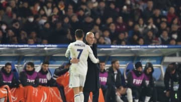 Real Madrid head coach Zinedine Zidane (R) and forward Cristiano Ronaldo gesture as Ronaldo is substituted during extra-time of the Club World Cup football final match between Kashima Antlers of Japan and Real Madrid of Spain at Yokohama International stadium in Yokohama on December 18, 2016. / AFP / Kazuhiro NOGI (Photo credit should read KAZUHIRO NOGI/AFP/Getty Images)