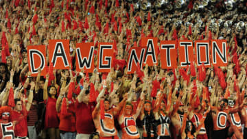 ATHENS, GA - SEPTEMBER 19: Fans of the Georgia Bulldogs celebrate after a score against South Carolina Gamecocks on September 19, 2015 in Atlanta, Georgia. Photo by Scott Cunningham/Getty Images)