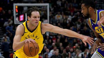 SALT LAKE CITY, UT - NOVEMBER 26: Bojan Bogdanovic #44 of the Indiana Pacers drives past Derrick Favors #15 of the Utah Jazz in the first half of a NBA game at Vivint Smart Home Arena on November 26, 2018 in Salt Lake City, Utah. (Photo by Gene Sweeney Jr./Getty Images)