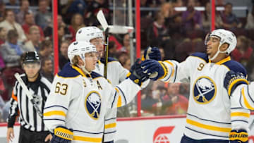 Sep 26, 2015; Ottawa, Ontario, CAN; The Buffalo Sabres celebrate a goal scored by center Tyler Ennis (63) in the first period against the Ottawa Senators at Canadian Tire Centre. Mandatory Credit: Marc DesRosiers-USA TODAY Sports