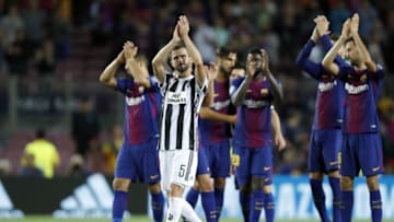 (L-R) Luis Suarez of FC Barcelona, Miralem Pjanic of Juventus FC, Andre Gomes of FC Barcelona, Lionel Messi of FC Barcelona, Samuel Umtiti of FC Barcelona, Gerard Pique of FC Barcelona, Sergio Busquets of FC Barcelona. (Photo by VI Images via Getty Images)