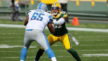 GREEN BAY, WISCONSIN - SEPTEMBER 20: Tyrell Crosby #65 of the Detroit Lions blocks against Preston Smith #91 of the Green Bay Packers in the third quarter at Lambeau Field on September 20, 2020 in Green Bay, Wisconsin. (Photo by Dylan Buell/Getty Images)