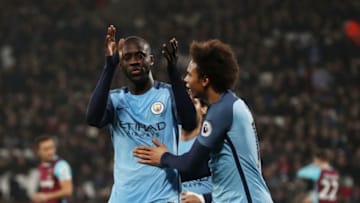 STRATFORD, ENGLAND - FEBRUARY 01: Yaya Toure of Manchester City celebrates scoring his team's fourth goal with Leroy Sane during the Premier League match between West Ham United and Manchester City at London Stadium on February 1, 2017 in Stratford, England. (Photo by Clive Rose/Getty Images)