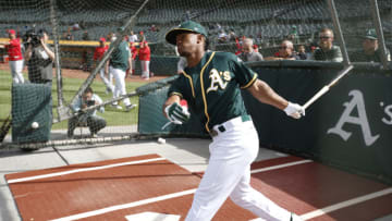OAKLAND, CA - JUNE 15: First round draft pick Kyler Murray of the Oakland Athletics takes batting practice after signing his contract at the Oakland Alameda Coliseum on June 15, 2018 in Oakland, California. (Photo by Michael Zagaris/Oakland Athletics/Getty Images)
