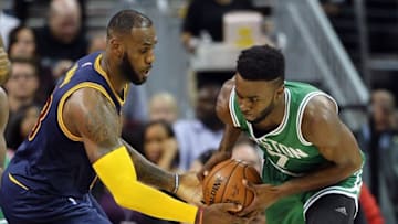 Nov 3, 2016; Cleveland, OH, USA; Cleveland Cavaliers forward LeBron James (23) fights for the ball with Boston Celtics forward Jaylen Brown (7) during the first quarter at Quicken Loans Arena. Mandatory Credit: Ken Blaze-USA TODAY Sports