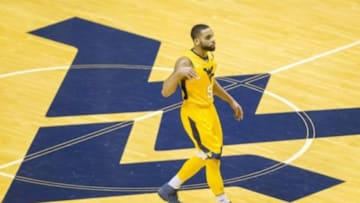 Feb 6, 2016; Morgantown, WV, USA; West Virginia Mountaineers guard Jaysean Paige (5) celebrates after making a three pointer during the first half against the Baylor Bears at the WVU Coliseum. Mandatory Credit: Ben Queen-USA TODAY Sports
