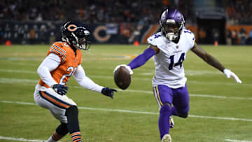 CHICAGO, IL - NOVEMBER 18: Stefon Diggs #14 of the Minnesota Vikings runs the football out of bounds against Prince Amukamara #20 of the Chicago Bears in the fourth quarter at Soldier Field on November 18, 2018 in Chicago, Illinois. (Photo by Stacy Revere/Getty Images)