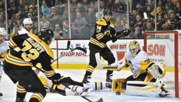 BOSTON, MA - NOVEMBER 18: Boston Bruins Defenceman Charlie McAvoy (73) takes the shot on Pittsburgh Penguins Goalie Matt Murray (30). During the Boston Bruins game against the Pittsburgh Penguins on November 24, 2017 at TD Bank Garden in Boston, MA. (Photo by Michael Tureski/Icon Sportswire via Getty Images)