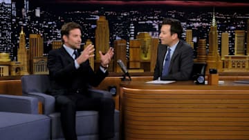 NEW YORK, NY - OCTOBER 03: Bradley Cooper and host Jimmy Fallon during a segment on "The Tonight Show Starring Jimmy Fallon" at Rockefeller Center on October 3, 2018 in New York City. (Photo by Jamie McCarthy/Getty Images for NBC)