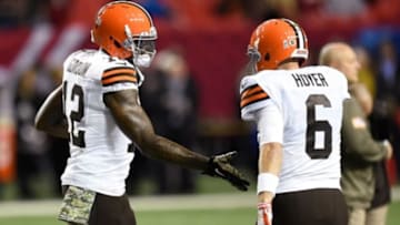 Nov 23, 2014; Atlanta, GA, USA; Cleveland Browns wide receiver Josh Gordon (12) shakes hands with quarterback Brian Hoyer (6) prior to the game against the Atlanta Falcons at the Georgia Dome. Mandatory Credit: Dale Zanine-USA TODAY Sports