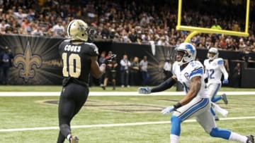 Dec 21, 2015; New Orleans, LA, USA; New Orleans Saints wide receiver Brandin Cooks (10) makes a 27-yard touchdown catch while defended by Detroit Lions cornerback Nevin Lawson (24) in the third quarter of the game at the Mercedes-Benz Superdome. Mandatory Credit: Chuck Cook-USA TODAY Sports