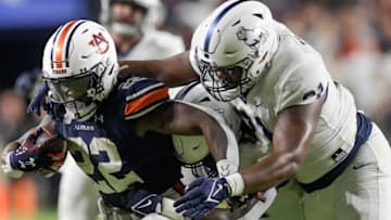 Auburn footballAuburn Tigers running back Damari Alston (22) tries to shake the tackle of Samford defenders during second half action in the AU vs. Samford game at Jordan-Hare Stadium in the AU campus in Auburn, Ala., on Saturday September 16, 2023.