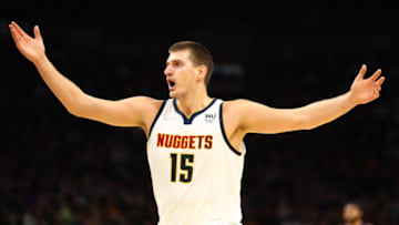 Denver Nuggets center Nikola Jokic reacts against the Phoenix Suns in the first half at Footprint Center on 20 Oct. 2021. (Mark J. Rebilas-USA TODAY Sports)