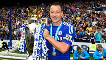LONDON, ENGLAND - MAY 24: John Terry of Chelsea celebrates with the trophy after the Barclays Premier League match between Chelsea and Sunderland at Stamford Bridge on May 24, 2015 in London, England. Chelsea were crowned Premier League champions. (Photo by Mike Hewitt/Getty Images)