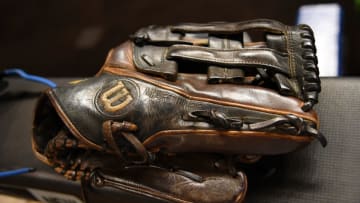 MIAMI, FL - MARCH 29: A detailed view of the Wilson glove of Martin Prado #14 of the Miami Marlins before Opening Day between the Miami Marlins and the Chicago Cubs at Marlins Park on March 29, 2018 in Miami, Florida. (Photo by Mark Brown/Getty Images)
