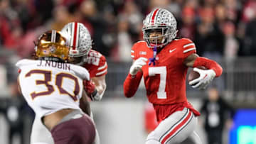 Nov 18, 2023; Columbus, Ohio, USA; Ohio State Buckeyes cornerback Jordan Hancock (7) gets a block from linebacker Steele Chambers (22) on Minnesota Golden Gophers running back Jordan Nubin (30) as he returns an interception during the NCAA football game at Ohio Stadium.