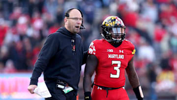 COLLEGE PARK, MD - NOVEMBER 17: Interim head coach Matt Canada of the Maryland Terrapins speaks to Tyrrell Pigrome #3 of the Maryland Terrapins during the second half against the Ohio State Buckeyes at Capital One Field on November 17, 2018 in College Park, Maryland. (Photo by Will Newton/Getty Images)